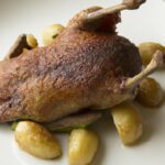 Mastering Crispy Duck Confit with Perfect Roasted Potatoes