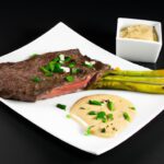 Savor Steak Frites Perfected with Zesty Garlic Aioli Flair