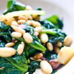 Golden Greens: Sautéed Spinach with Pine Nuts & Raisins
