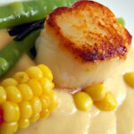 Golden Seared Scallops Resting on Velvet Corn Puree Delight
