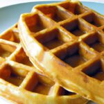 Fluffy Gluten-Free Waffles Drizzled with Maple Syrup Magic