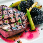 Savor Bison Steak Drizzled with Bold Blackberry Reduction