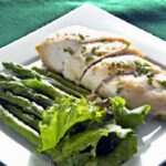Savor Herb-Crusted Chicken: A Fresh Mixed Greens Delight